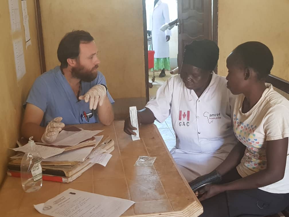 Daniel Maxwell, volunteer, attending to patients in South Sudan