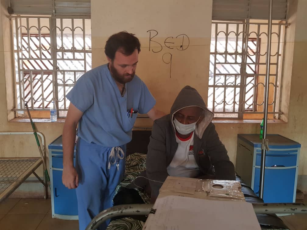 Daniel Maxwell, volunteer, attending to patients in South Sudan