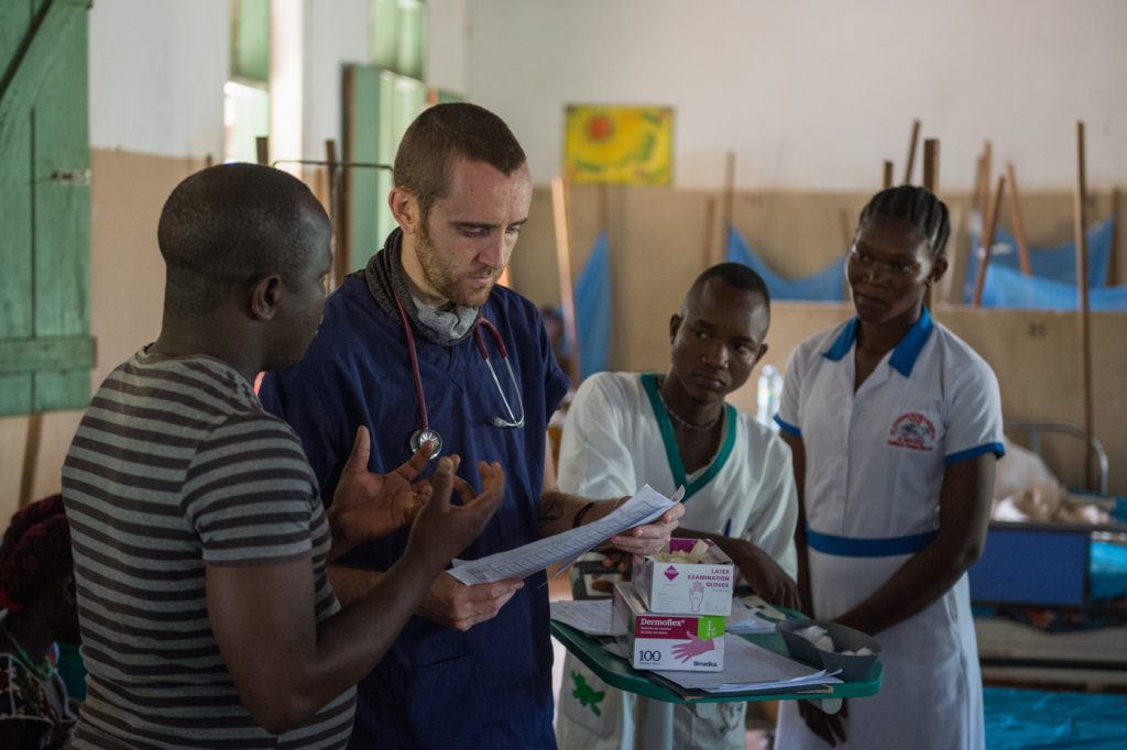 Dr. Matthew Jones with patients in South Sudan