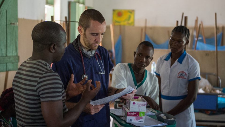 Dr. Matthew Jones with patients in South Sudan