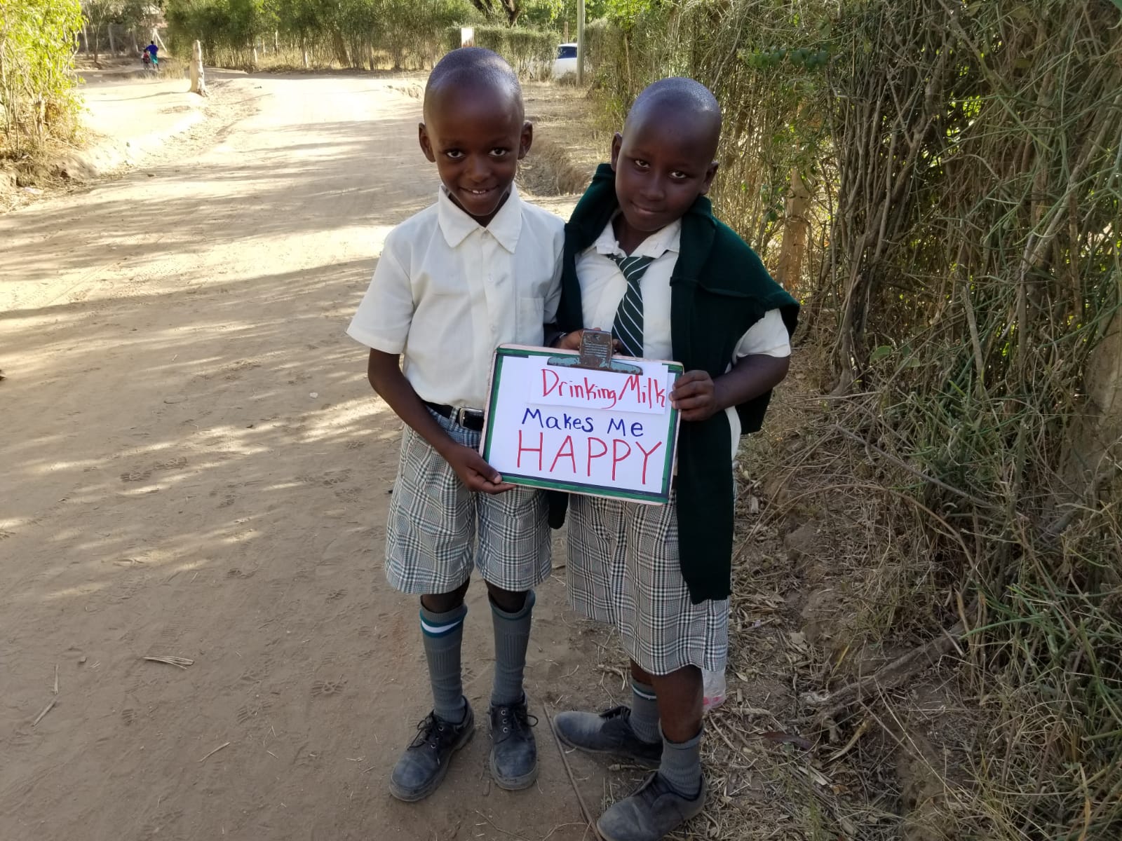 Drinking milk makes these boys happy according to their sign