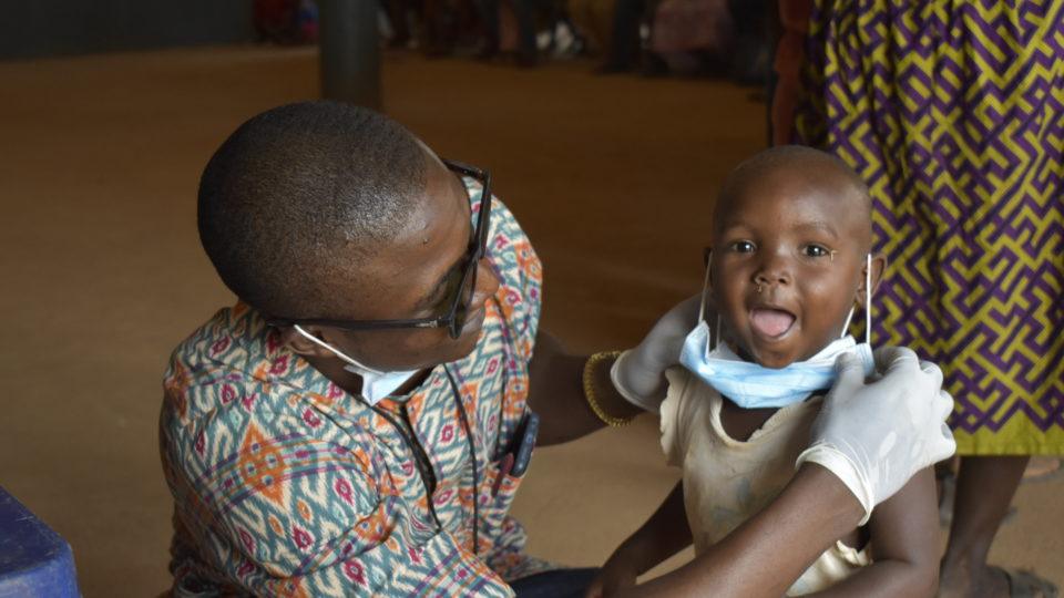 Cameroonian refugee child with mask