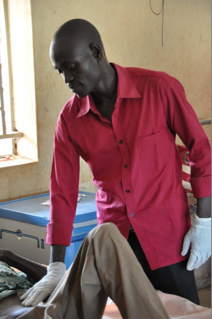 Photo of a health worker caring for a patient in Yambio South Sudan 