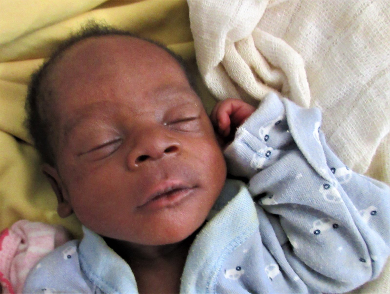 black newborn baby boy in hospital