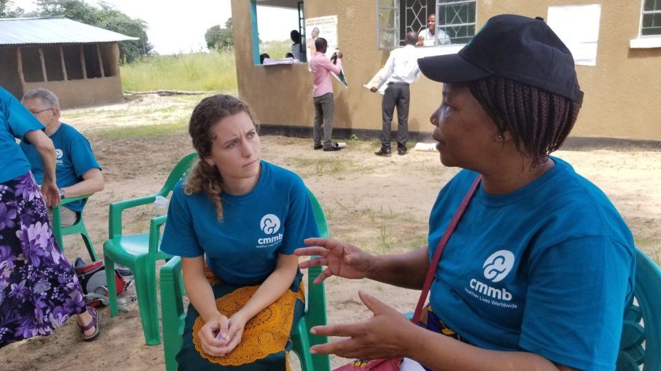 Rose with a community health worker