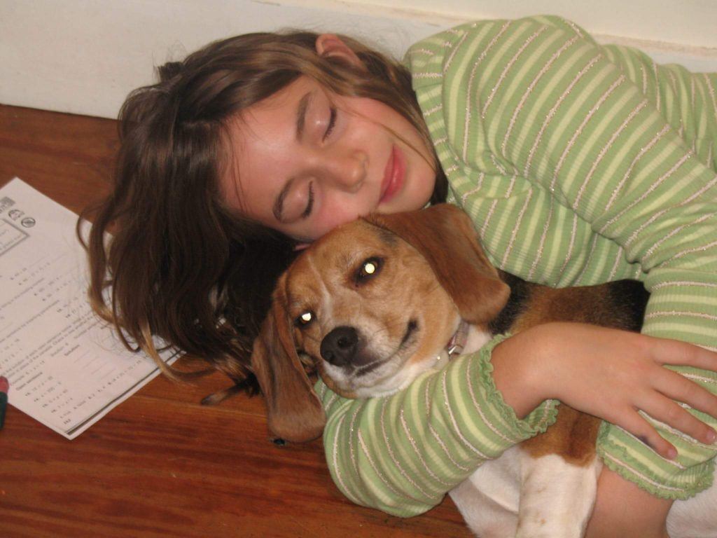 Sophia as a child with her dog 