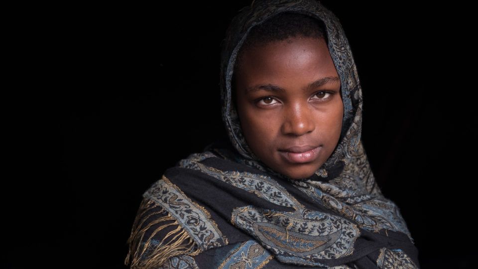 A photo of a young girl in South Sudan - She represents Tame a young girl who has only known civil war