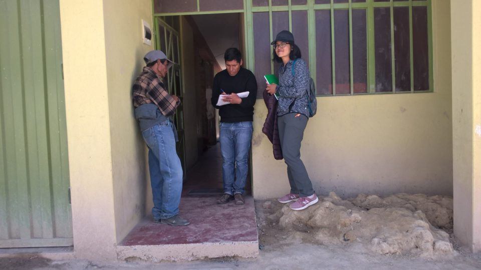 Shandy stands with CMMB staff members in Huancayo, Peru