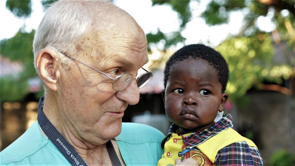 dr jim peck in sudan with baby