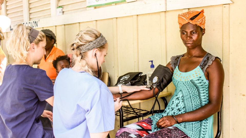 woman in a batey getting care