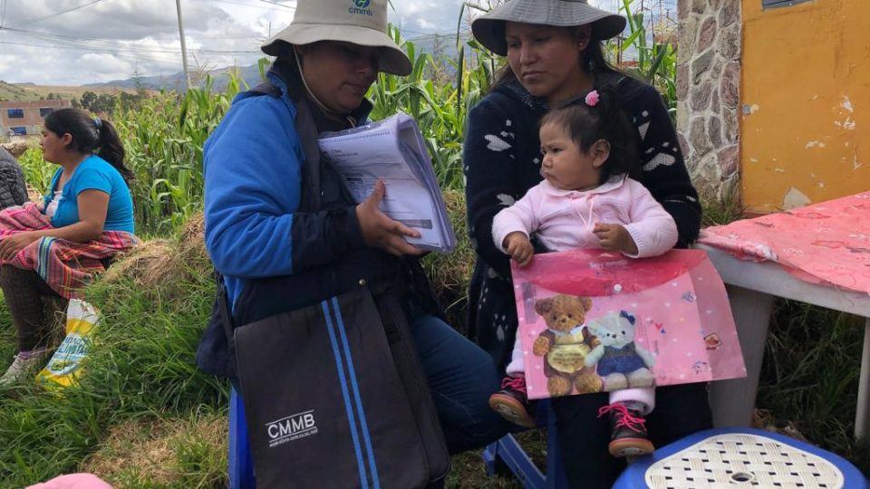 CHW serving a child in Peru