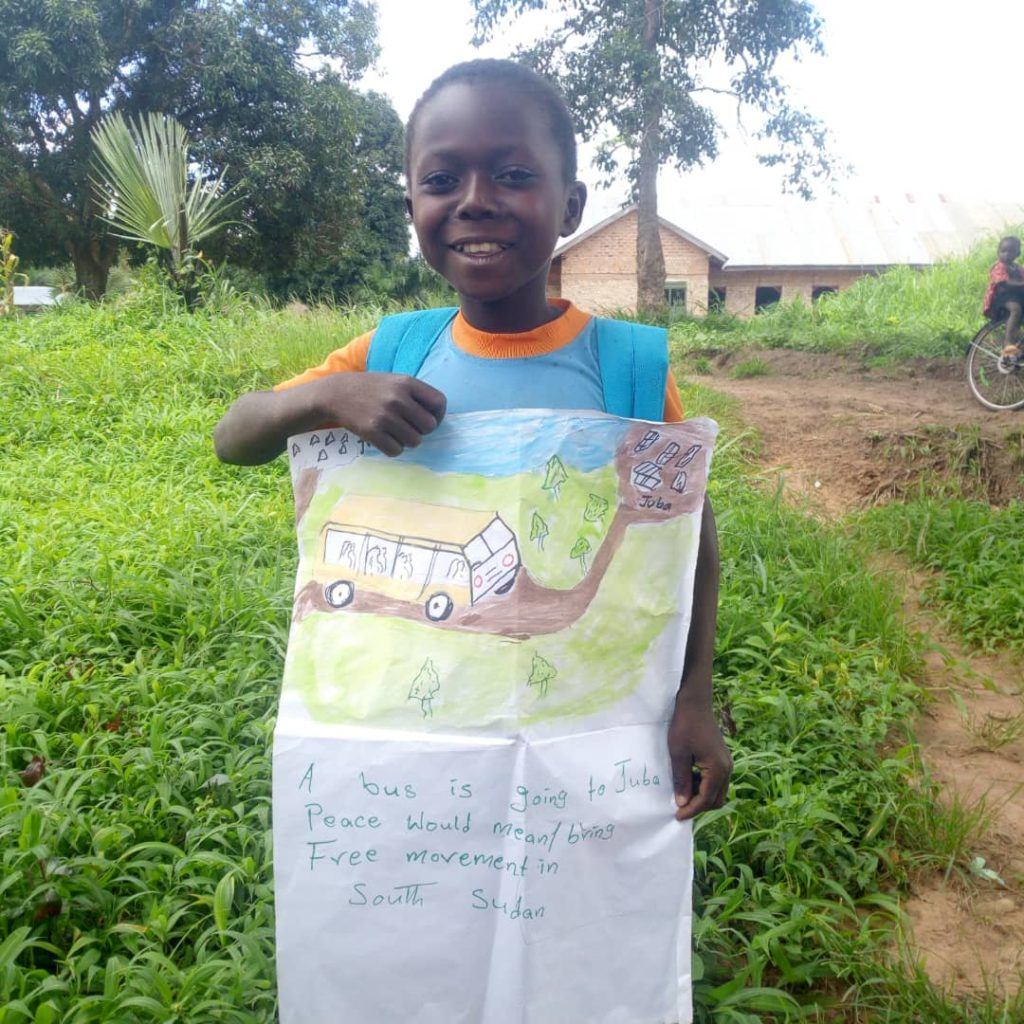 Peace means free movement. A little girl holds her drawing of a bus traveling to Juba.