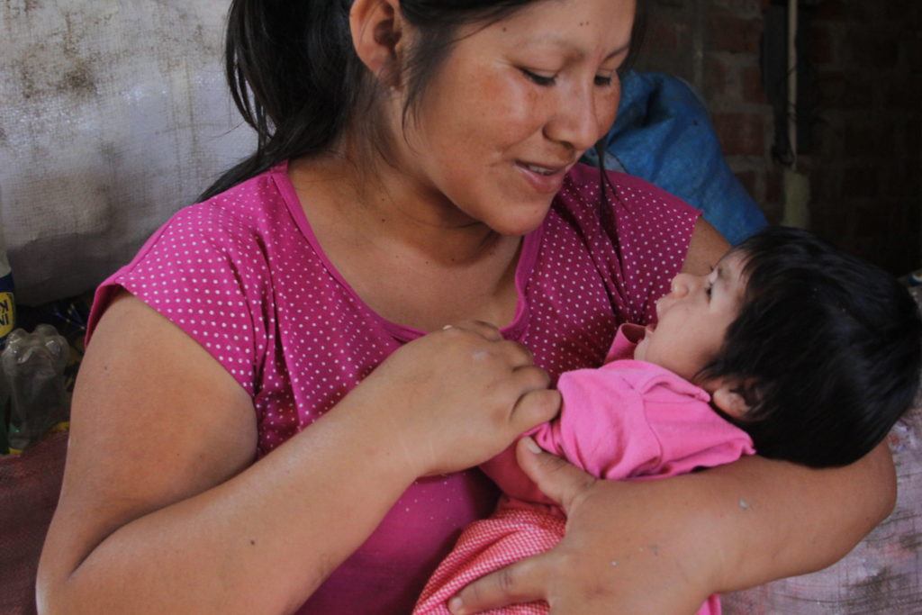 mother and baby in trujillo, peru