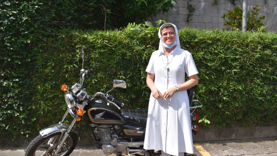 facility director and her motorcycle