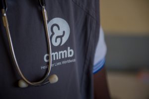 stethoscope and cmmb logo vest