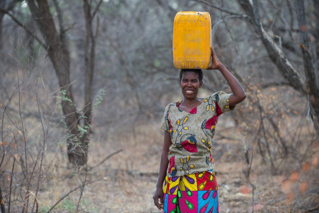 woman carrying water