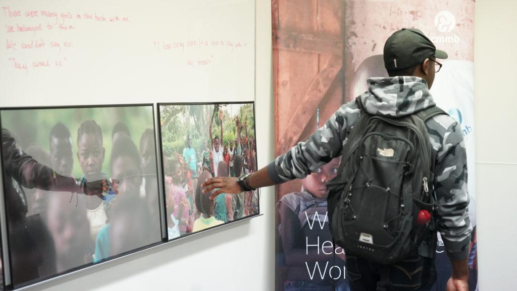 student looking at child soldier images