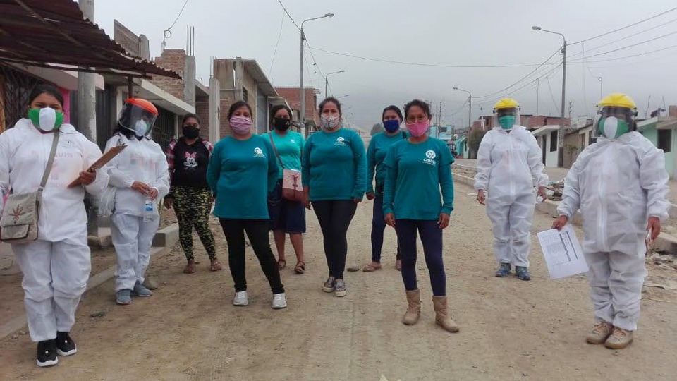 Community heath workers wearing PPE at part of COVID-19 response in Peru in June 2020.