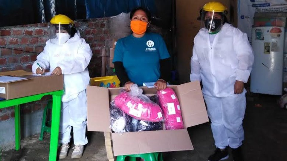 Community heath workers wearing PPE at part of COVID-19 response in Peru in June 2020.