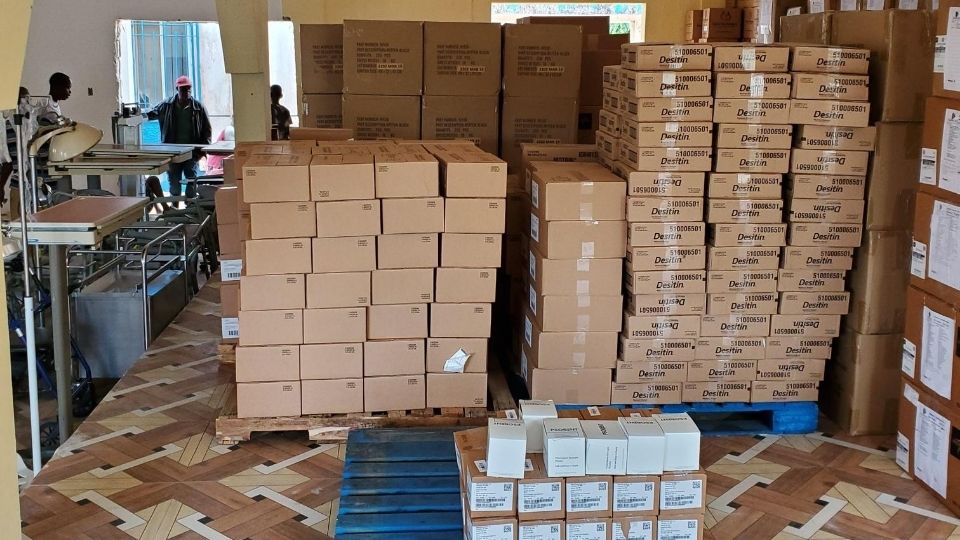 Packaged medical supplies sit inside a facility in Liberia in March 2020