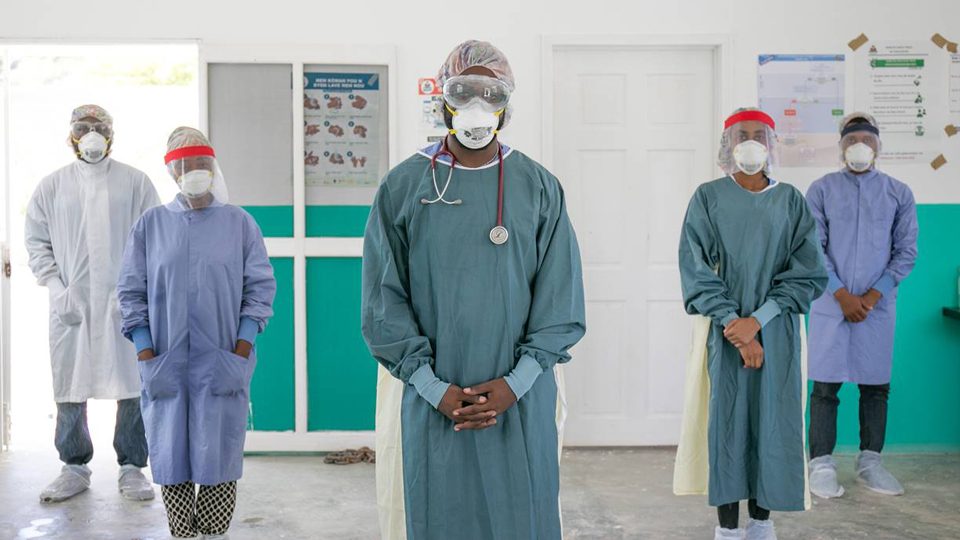 COVID-19 emergency response health care workers at Bishop Joseph Sullivan Center for Health hospital in Haiti in July 2020.