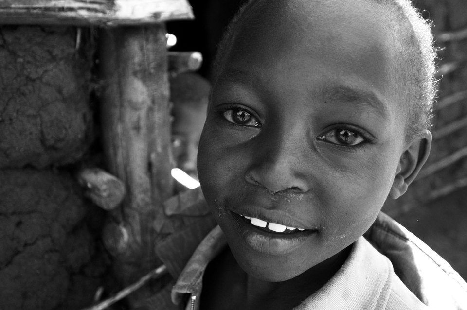 A boy staring at the camera with big eyes in Kenya in March 2005.