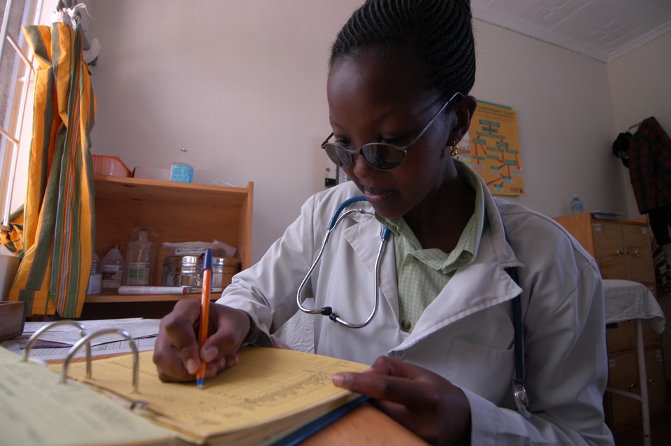 A doctor taking notes at a hospital in Kenya in March 2005.