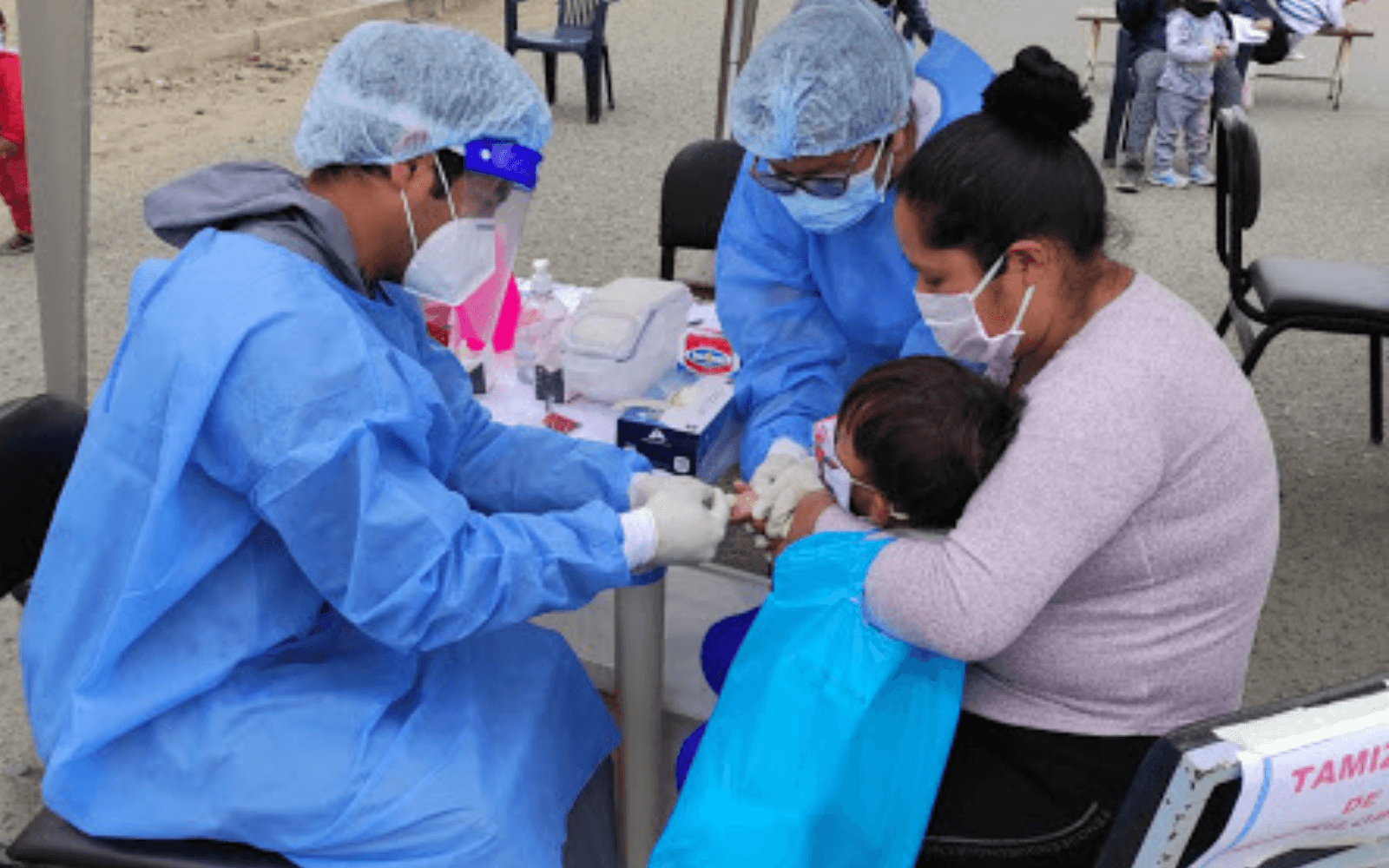 Healthcare worker in Peru helping patients