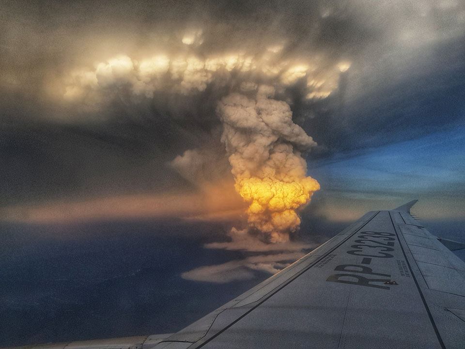 View of Taal Volcano eruption in the Philippines from airplane in January 2020.