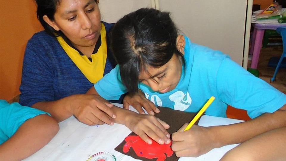 Andrea and her special needs daughter Leslie making crafts as part of an entrepreneurship workshop in Peru 2021.