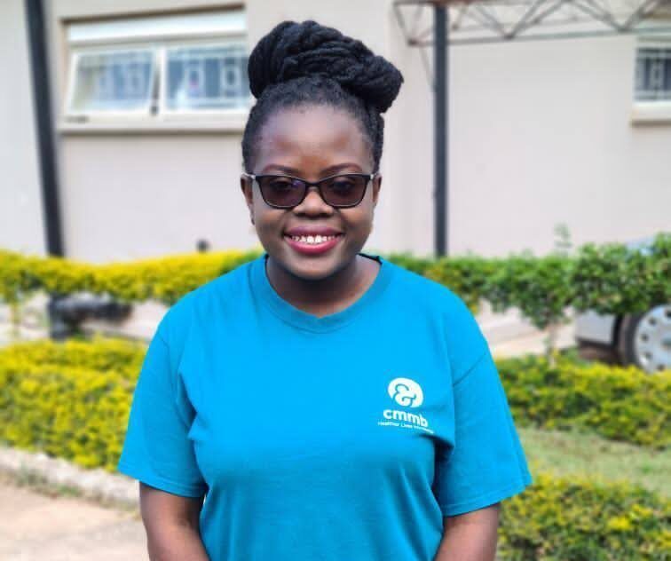 woman smiling in cmmb tshirt