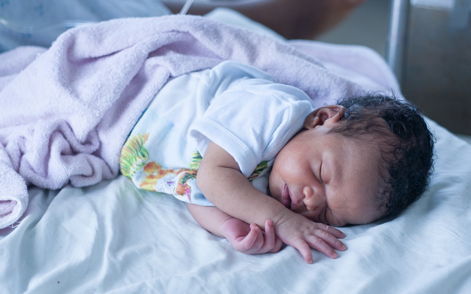 A newborn infant sleeping at Bishop Joseph Sullivan hospital in Cotes-de-Fer, Haiti.