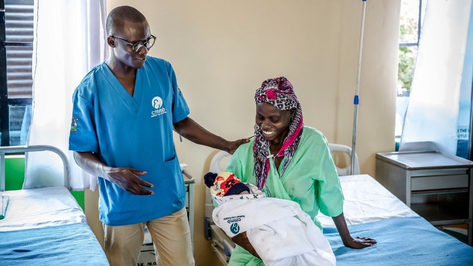 Mom receiving care from doctor at the new maternity ward in Kenya 
