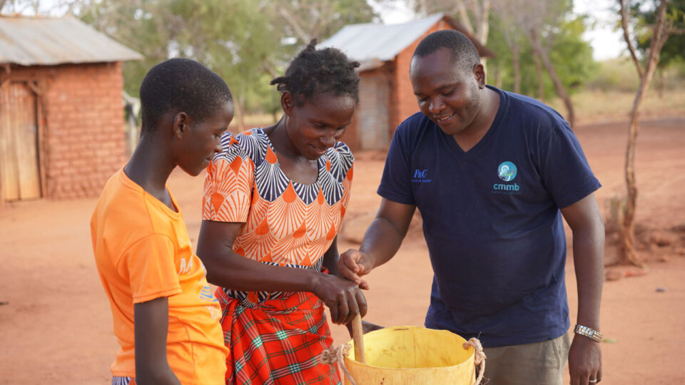 Joseph with a community family