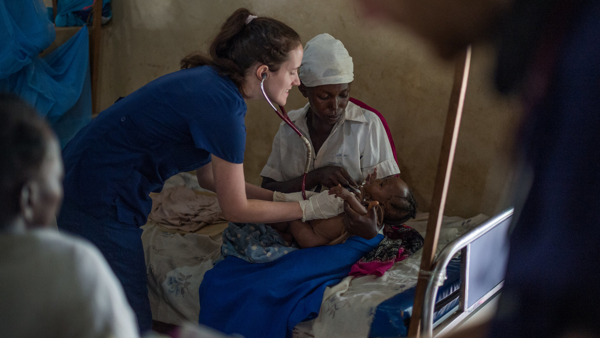 Sarah Rubino servers a mother and child in south sudan_June2022