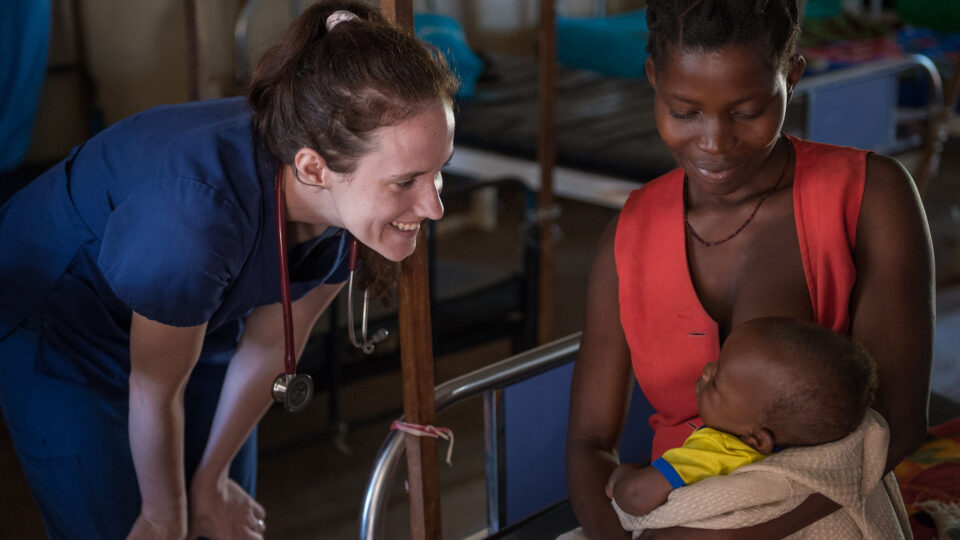 Global health volunteer nurse Sarah Rubino offers care to a patient at St. Therese Hospital in South Sudan