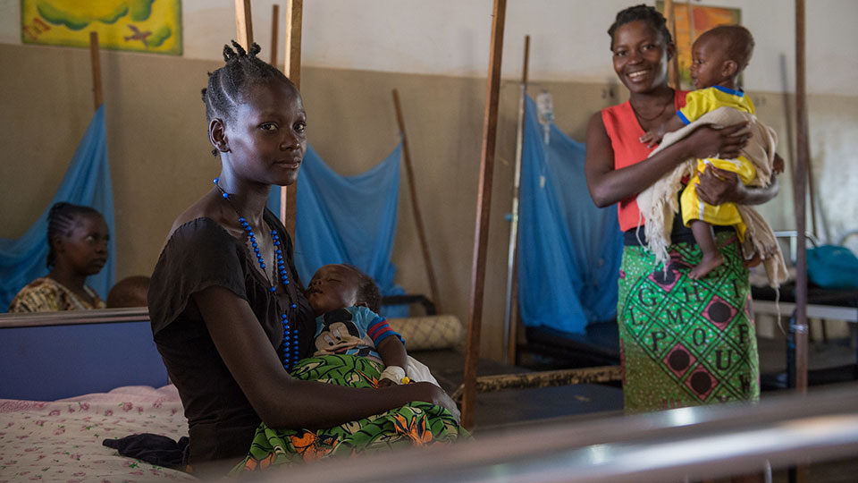 Mothers hold their babies at St. Therese Hospital in Nzara, South Sudan_CMMB_2018