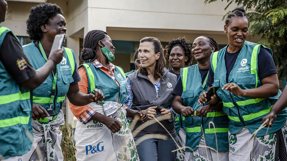 Mary Beth Powers and community health workers_CMMB Kenya_April 2022. In this press release, CMMB announces Mary Beth will receive and Honorary Doctor of Laws Degree