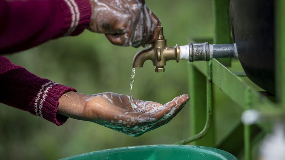 Washing hands at CMMB hand washing station. 1 hospital every 4 do not have access to a reliable water source_Kenya 2023 April