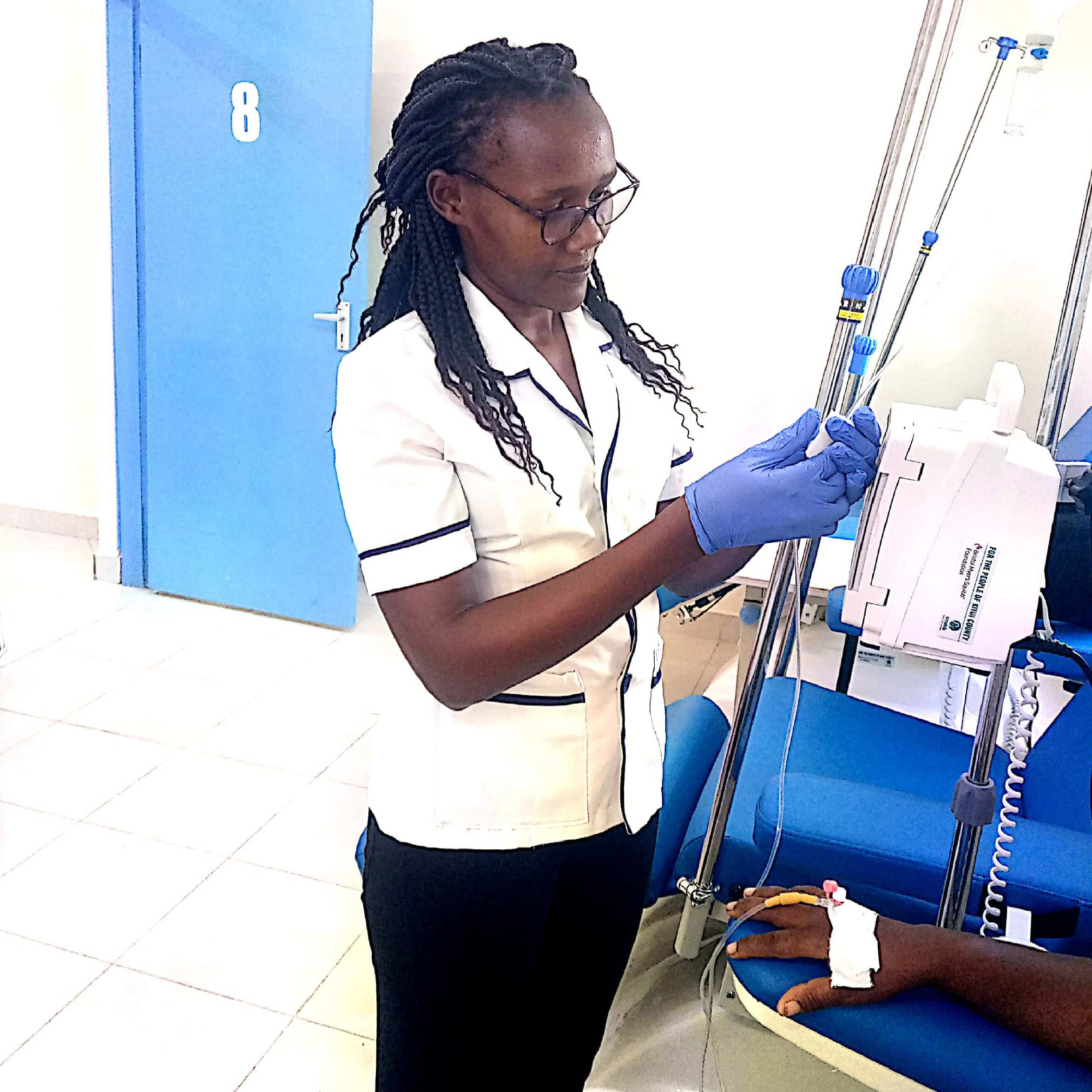 Theresia Mukethe as a practicing nurse CMMB Kenya 