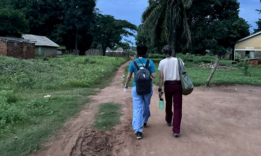 Dr. Mahvash walks with a staff a CMMB staff member in South Sudan