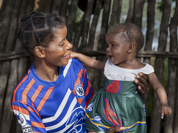 Mom-and-baby-at-community-wellness-check-CMMB-Zambia-2023 Mom and baby at a community wellness check in Zambia. Today we celebrate Mother's Day.