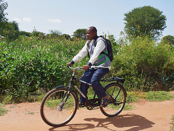 Community-health-promoter-joseph Community health promoter Joseph rides his bike.