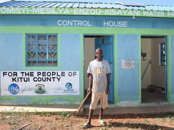 Richard Control House CMMB Kenya Richard stands in front of the control house.
