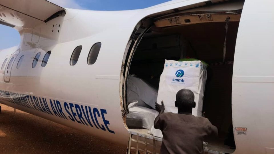 CMMB emergency supplies are loaded onto a humanitarian relief shipment plant