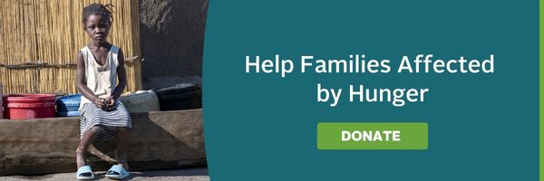 July footer that says "help families affected by hunger" with a donate button. 